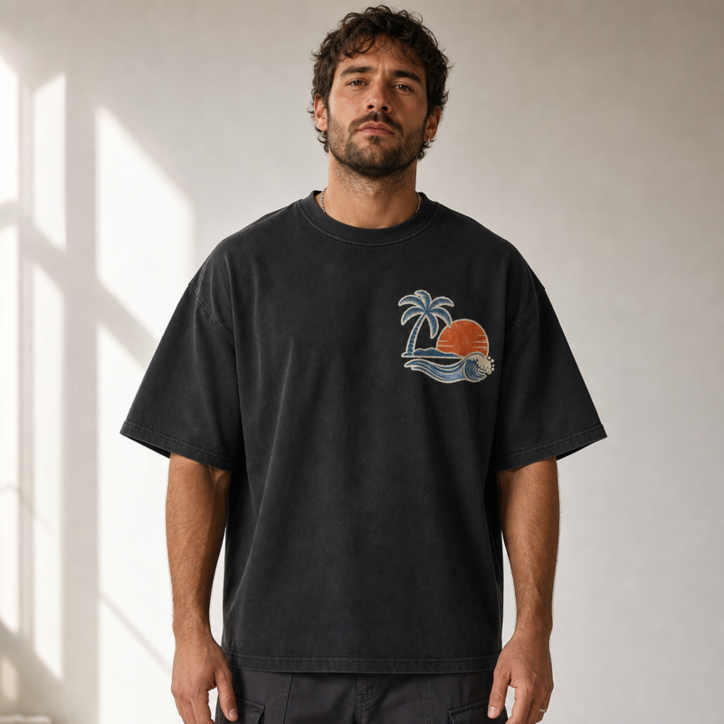 Solstice Horizon Oversized Tee in Faded Black – front view worn by an adult man