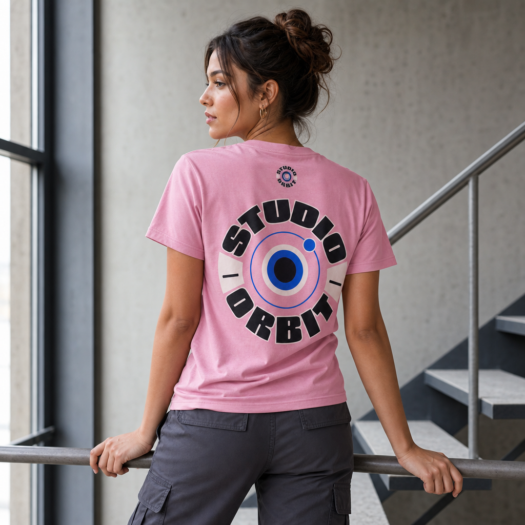 Studio Orbit Women's Tee in White – back view worn by an adult woman