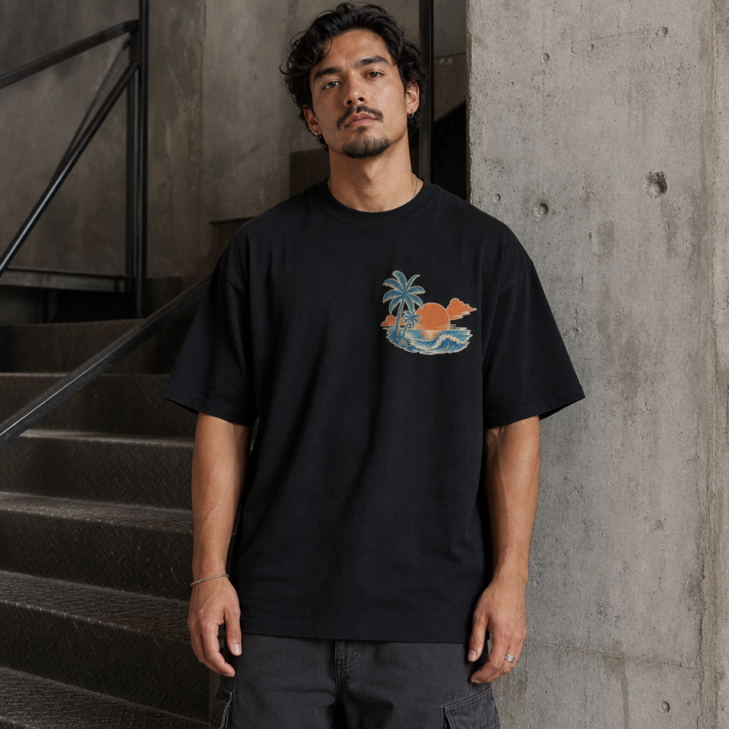 Sun On Repeat Oversized Tee in Black – front view worn by an adult man
