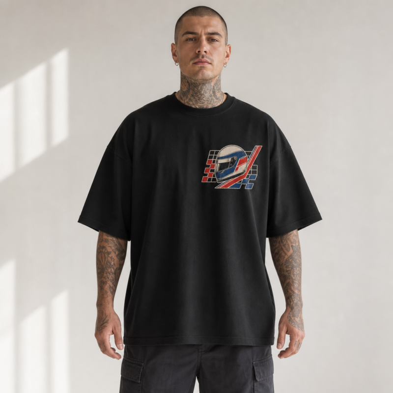 Touring Club Oversized Tee in Black – front view worn by an adult man