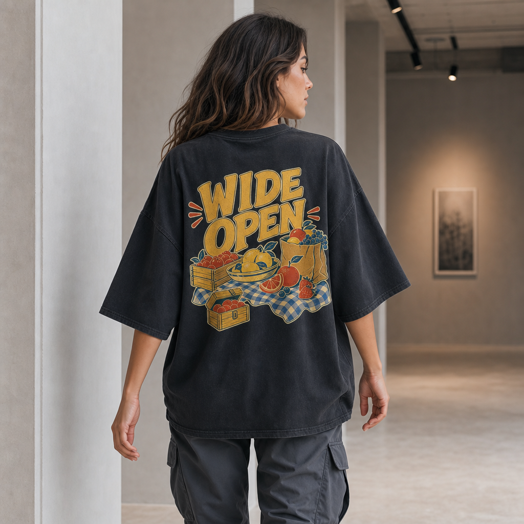 Wide Open Oversized Tee in Black – back view worn by an adult woman