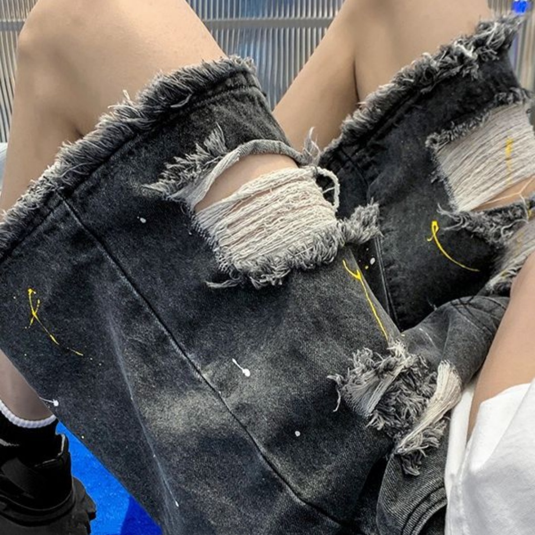 Men’s Distressed Denim Shorts with Frayed Hems and Paint Flecks