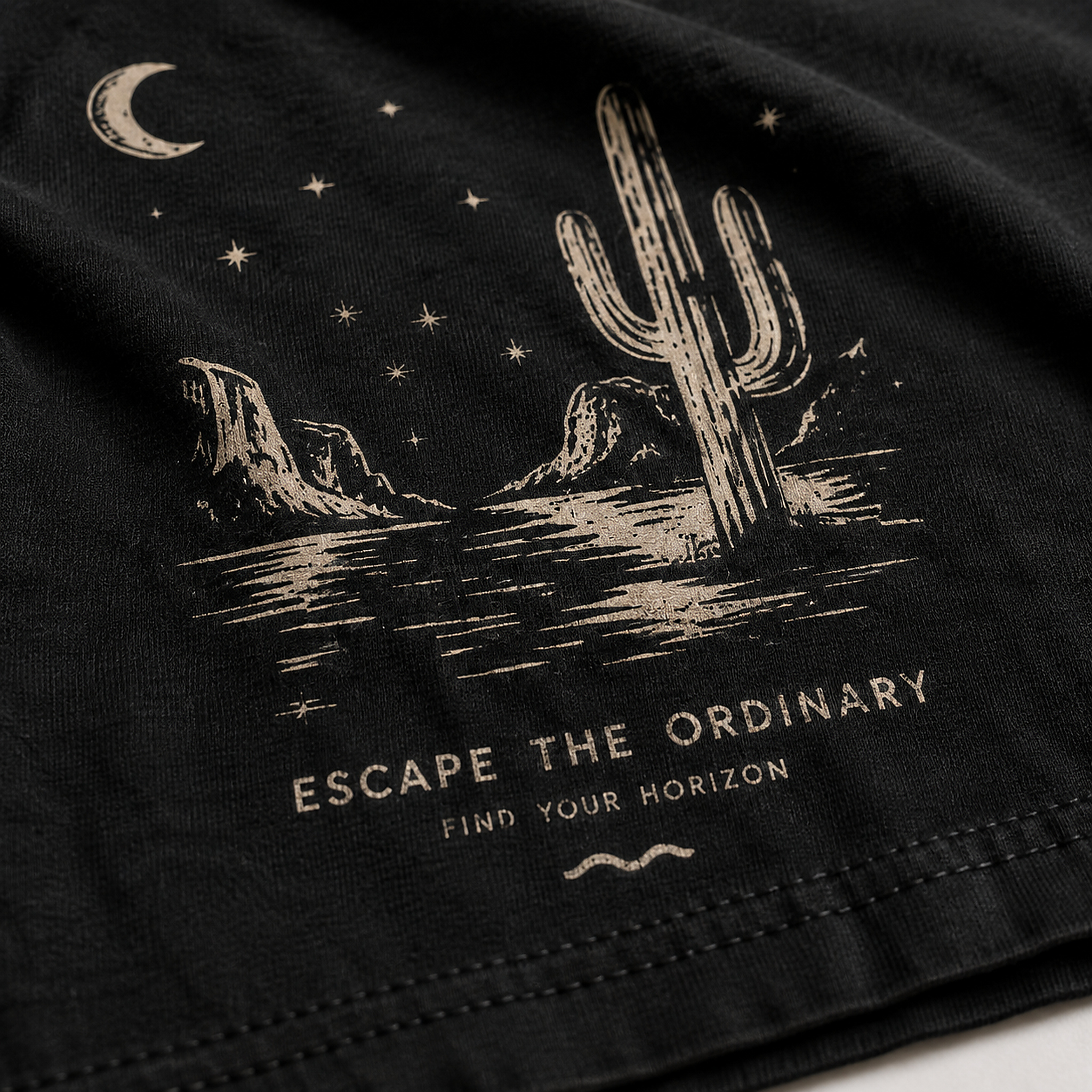 Far Away Days Tee Black close-up of fabric print and stitching