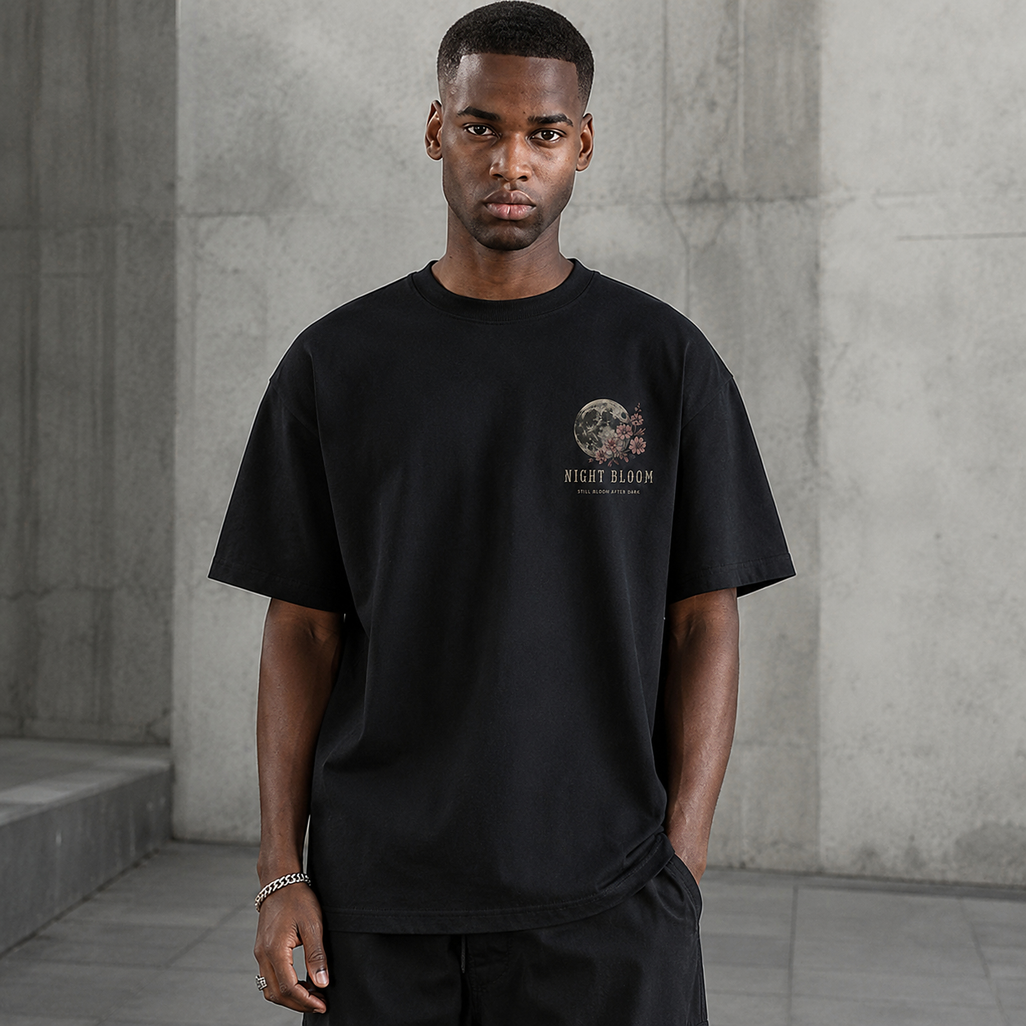 Model wearing the Night Bloom Tee in Black from the front