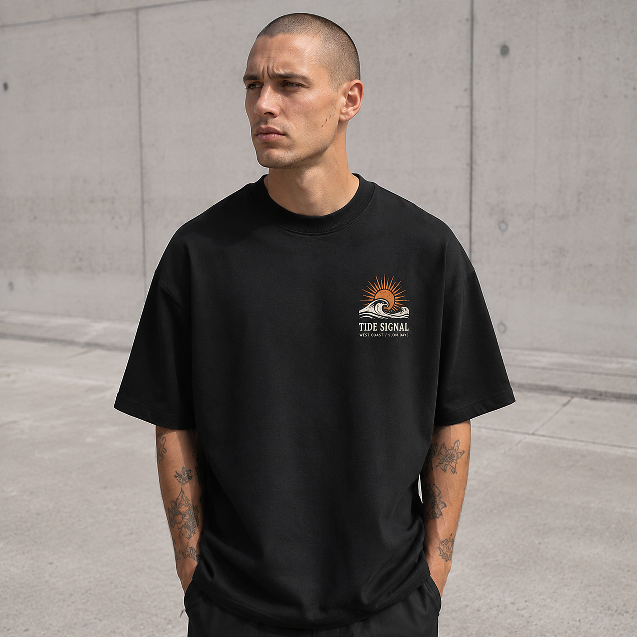 Model wearing the Tide Signal Tee in Black from the front